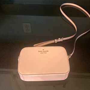 Gently used women’s Crossbody Kate Spade bag in pink. Small.